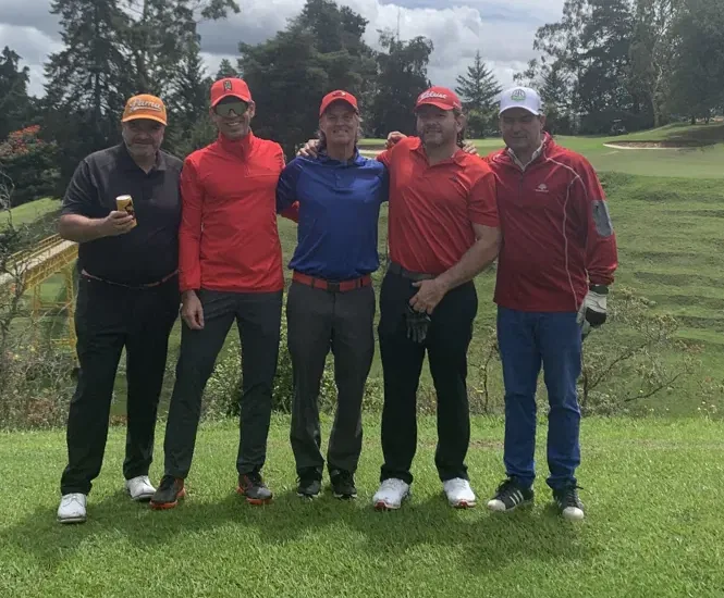 Robert Phillips, in blue in the middle, with four playing partners